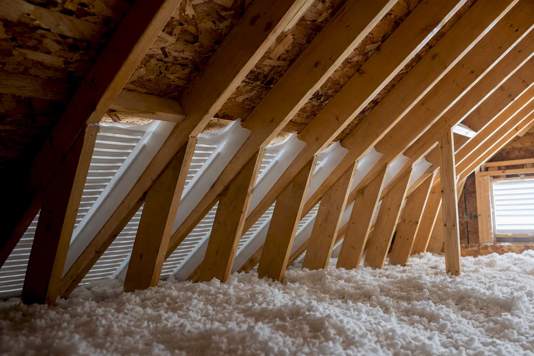 Ventilation baffles installed in attic rafter bays