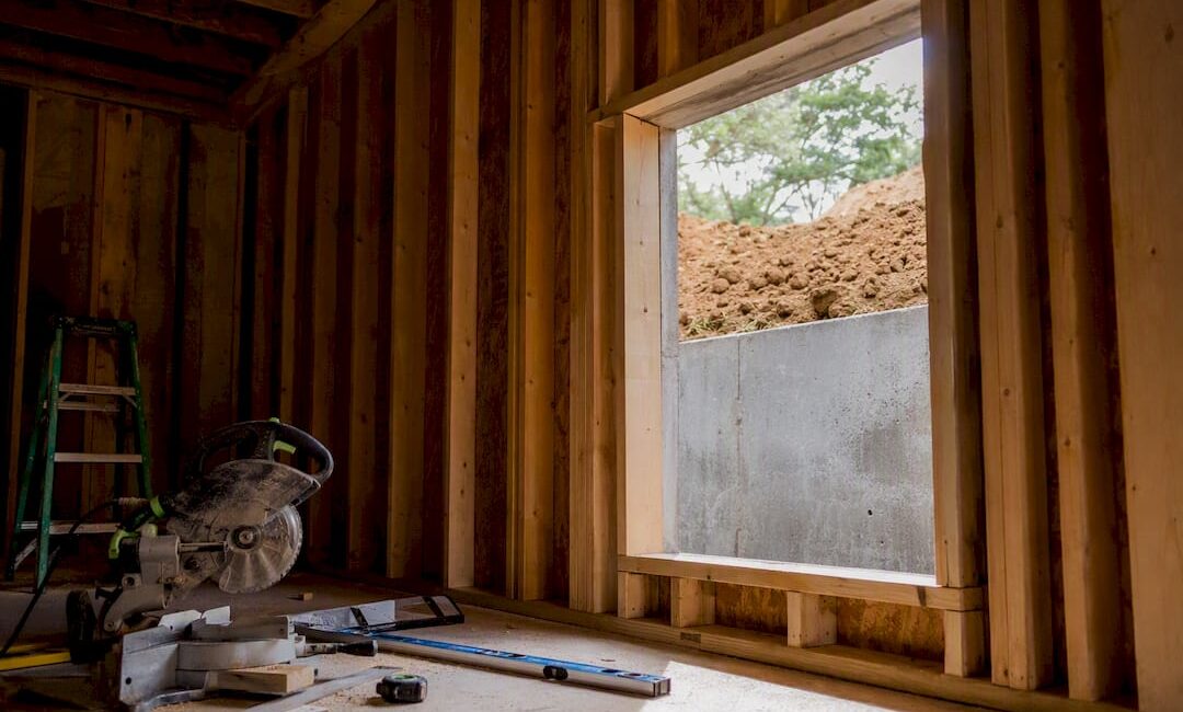 Basement window framed for egress compliance