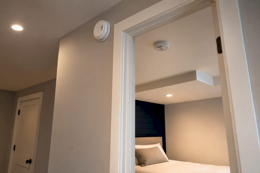 Smoke and carbon monoxide alarms near bedroom