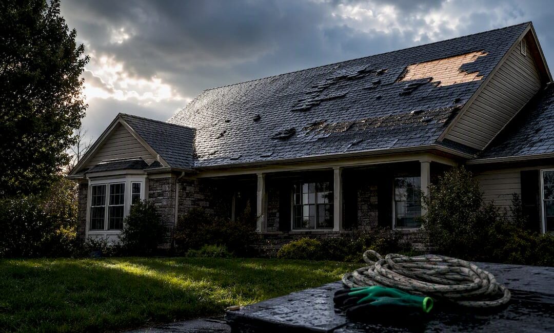 Storm damaged suburban roof after heavy rain