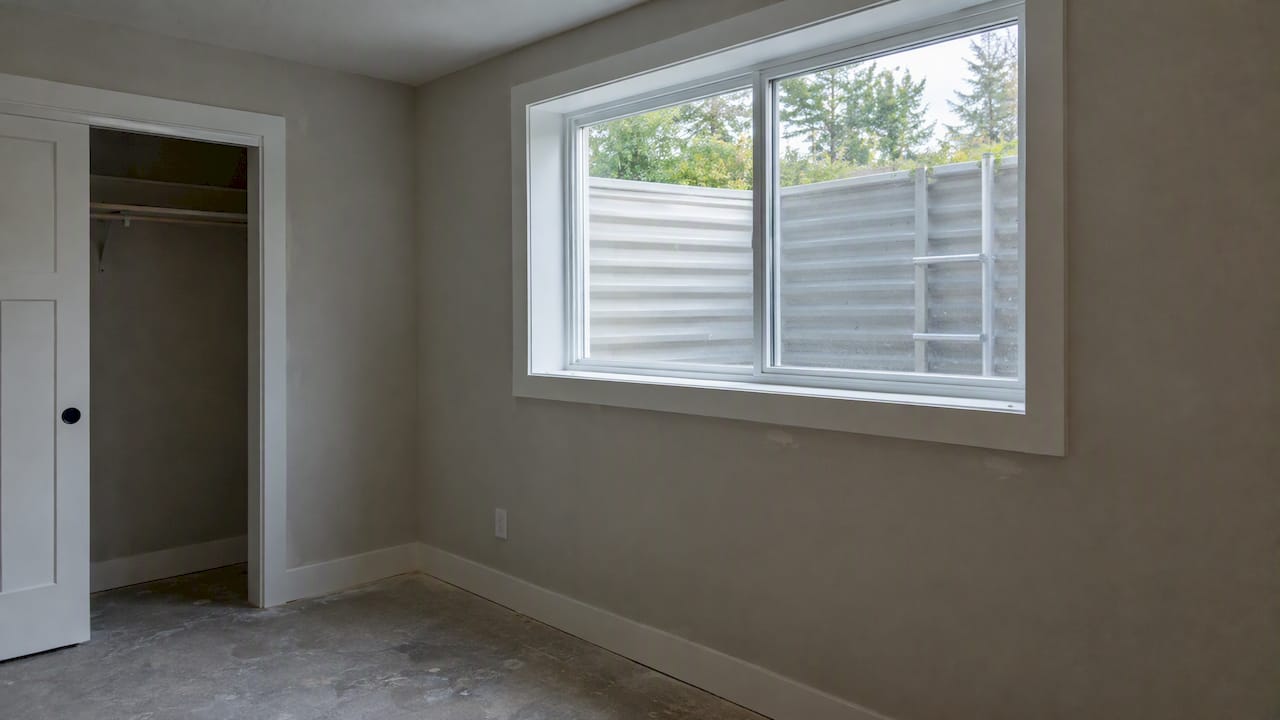 Egress window bringing daylight into converted bedroom