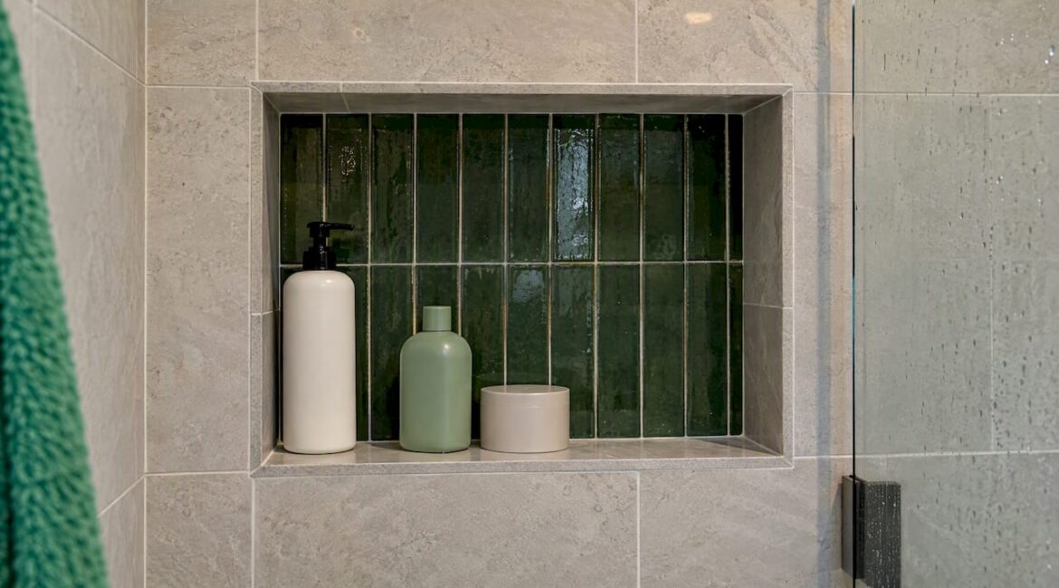 Finished tiled shower niche in a home bathroom