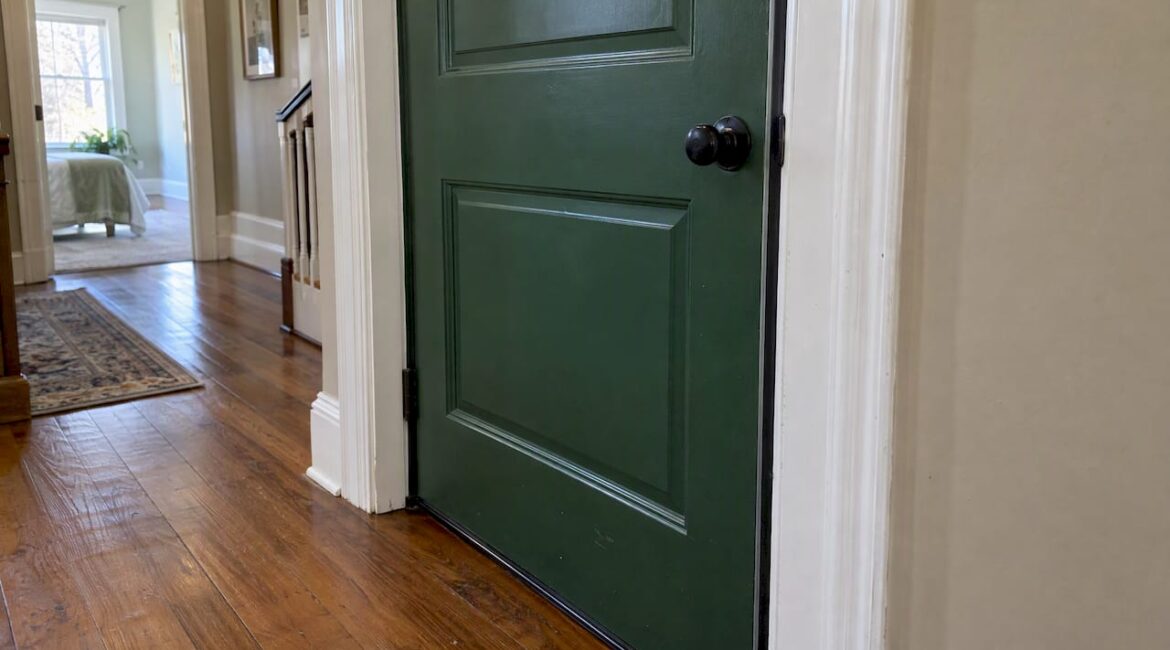 Solid-core interior door with perimeter seals